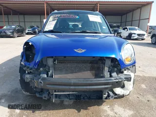 2015 MINI Countryman with VIN WMWZB3C56FWR43443, listed as a IAAI auction lot 41920848 with 91,192 mi miles and . Bid and sale history available at DreamBid. Image 13.