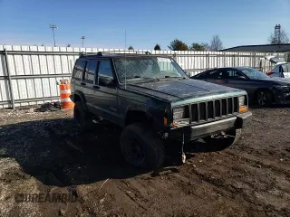 1999 Jeep Cherokee SE with VIN 1J4FF28S3XL551875, listed as a Copart auction lot 43057555 with 226,794 mi miles and Salvage title. Bid and sale history available at DreamBid. Image 12.