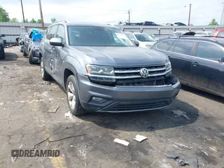 2019 Volkswagen Atlas SE z VIN 1V2DR2CA4KC524033, wystawiony jako IAAI lot #42104613 z przebiegiem 97 362 mil mil oraz . Historia ofert i sprzedaży dostępna na DreamBid. Obrazek 1.