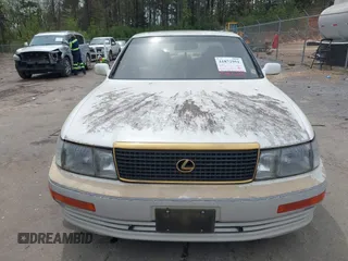 1991 Lexus LS z VIN JT8UF11E6M0075970, wystawiony jako IAAI lot #41872951 z przebiegiem 217 251 mil mil oraz . Historia ofert i sprzedaży dostępna na DreamBid. Obrazek 6.