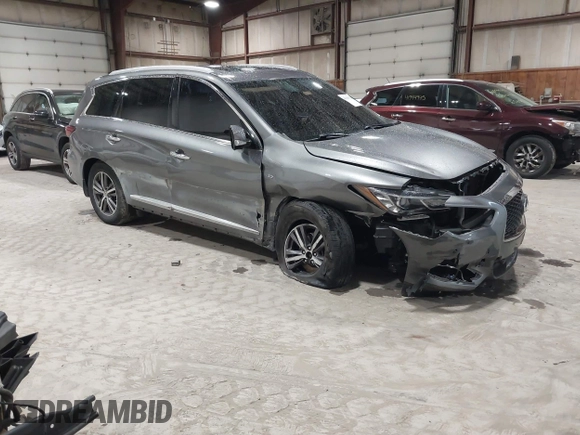 2017 Infiniti QX60 with VIN 5N1DL0MM1HC528514, listed as a IAAI auction lot 41986931 with 90,033 mi miles and . Bid and sale history available at DreamBid. Image 1.