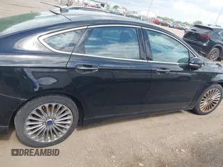 2016 Ford Fusion Titanium with VIN 3FA6P0K97GR135106, listed as a IAAI auction lot 42269165 with 155,036 mi miles and . Bid and sale history available at DreamBid. Image 13.