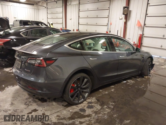2020 Tesla Model 3 Performance z VIN 5YJ3E1EC3LF641768, wystawiony jako IAAI lot #41542615 z przebiegiem 43 343 mil mil oraz . Historia ofert i sprzedaży dostępna na DreamBid. Obrazek 4.