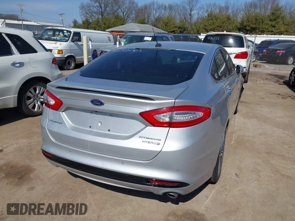2014 Ford Fusion Titanium Hybrid with VIN 3FA6P0RU9ER147443, listed as a IAAI auction lot 41739540 with 146,359 mi miles. Bid and sale history available at carsss.com. Image 4.