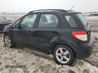 2009 Suzuki SX4 Man FWD with VIN JS2YA413996201623, listed as a Copart auction lot 84094154 with 0 mi miles and Salvage Title. Bid and sale history available at carsss.com. Image 2.