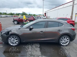 2014 Mazda 3 S Grand Touring with VIN JM1BM1M3XE1164610, listed as a IAAI auction lot 42421946 with 96,591 mi miles and . Bid and sale history available at DreamBid. Image 14.