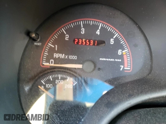 2002 Pontiac Grand Am SE1 z VIN 1G2NF52F02C166799, wystawiony jako Copart lot #70392914 z przebiegiem 235 531 mil mil oraz Szkoda całkowita • Salvage title. Historia ofert i sprzedaży dostępna na DreamBid. Obrazek 9.
