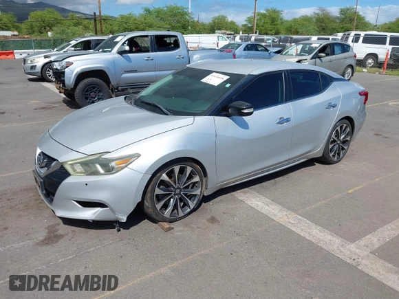 2016 Nissan Maxima SV with VIN 1N4AA6AP5GC395274, listed as a IAAI auction lot 41616698 with 102,736 mi miles and . Bid and sale history available at DreamBid. Image 17.