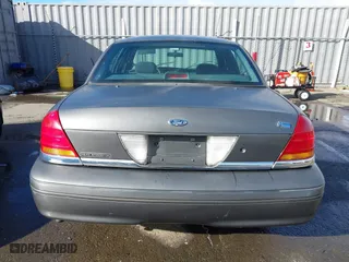 1999 Ford Crown Victoria Police Pkg with VIN 2FAFP71W9XX187581, listed as a IAAI auction lot 41522223 with 94,889 mi miles. Bid and sale history available at carsss.com. Image 16.