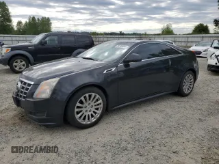 2014 Cadillac CTS with VIN 1G6DA1E39E0104049, listed as a Copart auction lot 56198085 with 121,622 mi miles and Salvage Title. Bid and sale history available at DreamBid. Image 1.