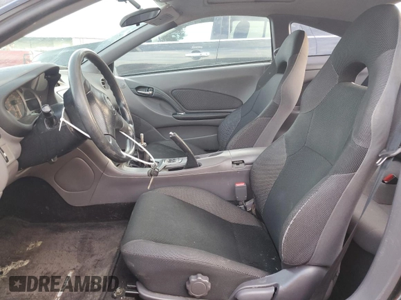 2002 Toyota Celica GT with VIN JTDDR32T720138265, listed as a Copart auction lot 87661215 with 188,822 mi miles and Salvage Title. Bid and sale history available at carsss.com. Image 7.
