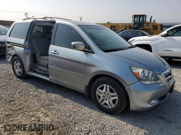 2006 Honda Odyssey EX-L z VIN 5FNRL38756B087695, wystawiony jako Copart lot #60122525 z przebiegiem 213 221 mil mil oraz Szkoda całkowita • Salvage title. Historia ofert i sprzedaży dostępna na DreamBid. Obrazek 4.