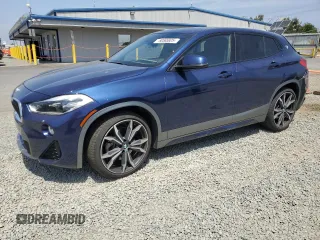 2018 BMW X2 sDrive28i with VIN WBXYJ3C36JEB37770, listed as a Copart auction lot 60565925 with 96,919 mi miles and Salvage title. Bid and sale history available at DreamBid. Image 1.