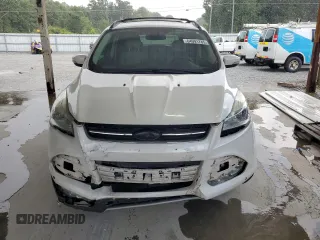 2013 Ford Escape SEL с VIN 1FMCU0H91DUB90163, выставлен на аукционе Copart как лот 64091785 с пробегом 156 038 миль миль и Списание • Salvage title. История ставок и продаж доступна на DreamBid. Изображение 5.