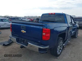 2018 Chevrolet Silverado 1500 LT with VIN 3GCPCREH1JG125997, listed as a IAAI auction lot 41884888 with 122,406 mi miles and . Bid and sale history available at DreamBid. Image 4.