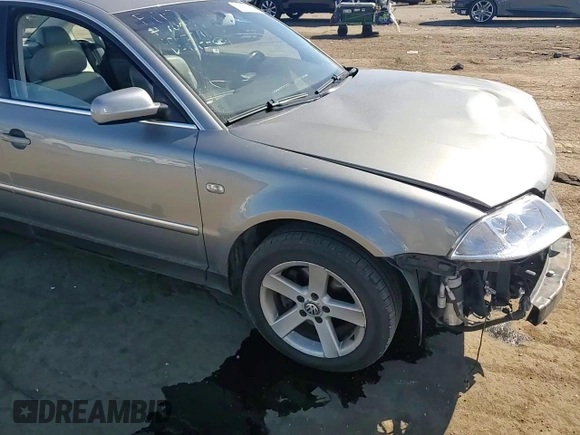 2004 Volkswagen Passat GLX z VIN WVWRH63B14P058955, wystawiony jako Copart lot #75076284 z przebiegiem 160 844 mil mil oraz Czysty tytuł • Clean title. Historia ofert i sprzedaży dostępna na DreamBid. Obrazek 11.