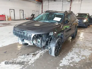 2023 Jeep Cherokee Altitude Lux with VIN 1C4PJMMB7PD107404, listed as a IAAI auction lot 41458661 with 30,683 mi miles. Bid and sale history available at carsss.com. Image 2.