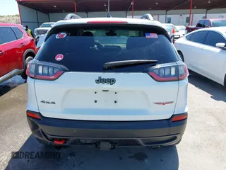 2021 Jeep Cherokee Trailhawk with VIN 1C4PJMBX1MD145169, listed as a IAAI auction lot 42340464 with 50,925 mi miles and . Bid and sale history available at DreamBid. Image 16.