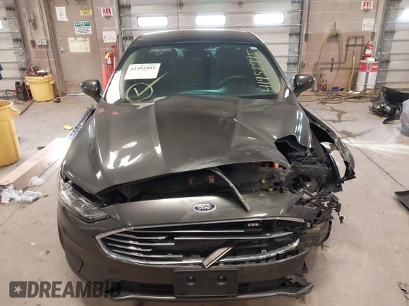 2020 Ford Fusion SE z VIN 3FA6P0LU4LR118809, wystawiony jako IAAI lot #41952995 z przebiegiem 35 353 mil mil oraz . Historia ofert i sprzedaży dostępna na DreamBid. Obrazek 13.