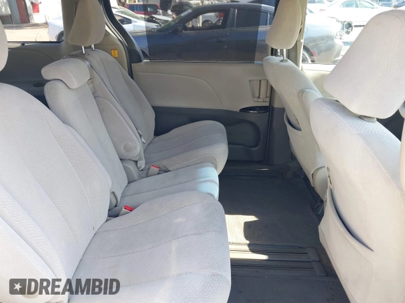 2012 Toyota Sienna LE AAS with VIN 5TDKK3DC5CS186077, listed as a IAAI auction lot 40265988 with 130,888 mi miles and . Bid and sale history available at DreamBid. Image 8.