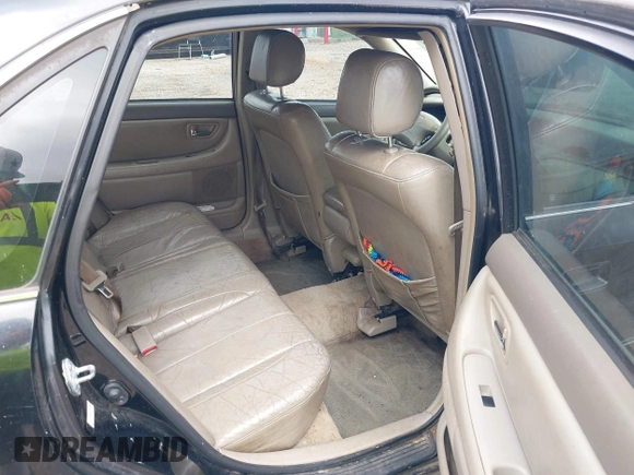 2001 Toyota Avalon XL z VIN 4T1BF28B61U191292, wystawiony jako IAAI lot #42239698 z przebiegiem 288 073 mil mil oraz . Historia ofert i sprzedaży dostępna na DreamBid. Obrazek 8.