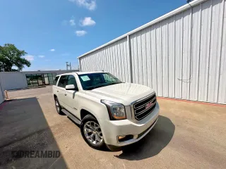 2015 GMC Yukon SLT z VIN 1GKS2BKC2FR234879, wystawiony jako Copart lot #60001685 z przebiegiem 231 463 mil mil oraz Czysty tytuł • Clean title. Historia ofert i sprzedaży dostępna na DreamBid. Obrazek 1.