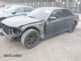 2019 Chrysler 300 S with VIN 2C3CCABG8KH601034, listed as a IAAI auction lot 41571454 with 104,632 mi miles and . Bid and sale history available at DreamBid. Image 18.
