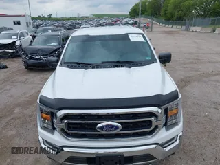 2021 Ford F-150 XL z VIN 1FTFW1ED7MFB36946, wystawiony jako IAAI lot #42318029 z przebiegiem 16 960 mil mil oraz . Historia ofert i sprzedaży dostępna na DreamBid. Obrazek 6.