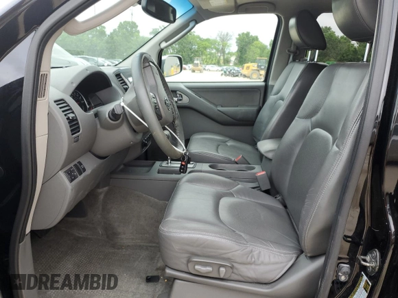 2011 Nissan Frontier Pro-4X with VIN 1N6AD0EVXBC433028, listed as a Copart auction lot 57653305 with 144,753 mi miles and Salvage title. Bid and sale history available at DreamBid. Image 7.
