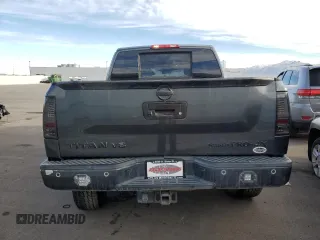 2013 Nissan Titan Pro-4X with VIN 1N6BA0EC2DN305708, listed as a Copart auction lot 45329275 with 68,636 mi miles and Salvage title. Bid and sale history available at DreamBid. Image 6.