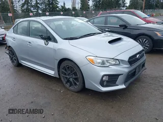 2021 Subaru WRX Premium with VIN JF1VA1C61M9823682, listed as a IAAI auction lot 41785670 with 71,626 mi miles. Bid and sale history available at carsss.com. Image 1.
