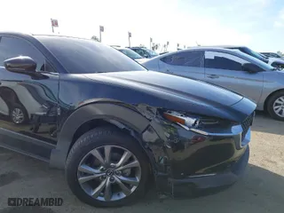 2021 Mazda CX-30 Select with VIN 3MVDMABL6MM248533, listed as a IAAI auction lot 41410489 with 82,365 mi miles. Bid and sale history available at carsss.com. Image 6.