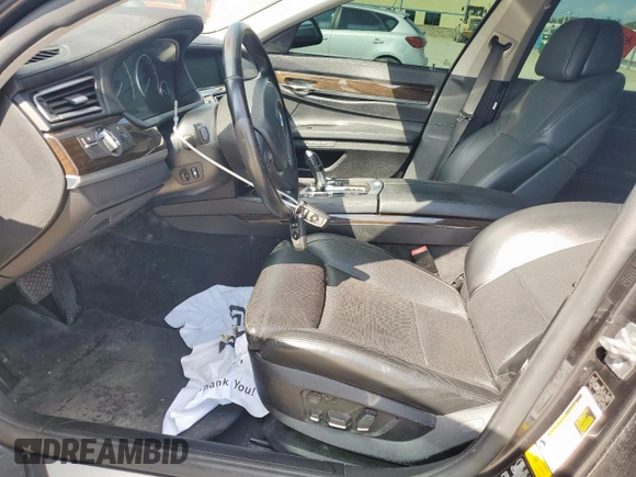 2012 BMW 7 Series 750Li xDrive с VIN WBAKC8C59CC437002, выставлен на аукционе Copart как лот 60975465 с пробегом Не указан миль и Чистый • Clean title. История ставок и продаж доступна на DreamBid. Изображение 7.