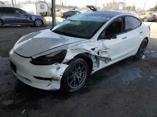 2021 Tesla Model 3 Standard Range Plus z VIN 5YJ3E1EA0MF940389, wystawiony jako Copart lot #53862835 z przebiegiem 31 284 mil mil oraz Szkoda całkowita • Salvage title. Historia ofert i sprzedaży dostępna na DreamBid. Obrazek 1.