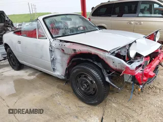 1991 Mazda MX-5 Miata Special Edition with VIN JM1NA3513M1216057, listed as a IAAI auction lot 42742791 with Not provided miles and . Bid and sale history available at DreamBid. Image 1.