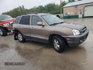 2005 Hyundai Santa Fe GLS with VIN KM8SC73EX5U001216, listed as a Copart auction lot 72630284 with 0 mi miles and Salvage Title. Bid and sale history available at carsss.com. Image 4.