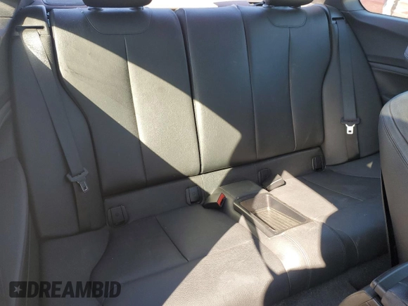 2015 BMW 2 Series 228i with VIN WBA1F5C50FV256672, listed as a Copart auction lot 50062235 with 120,213 mi miles and Salvage Title. Bid and sale history available at carsss.com. Image 10.