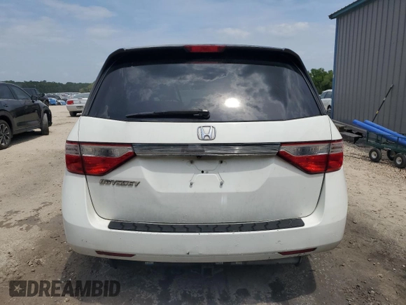 2013 Honda Odyssey EX z VIN 5FNRL5H43DB055987, wystawiony jako Copart lot #54001985 z przebiegiem 162 448 mil mil oraz Szkody całkowita. Historia ofert i sprzedaży dostępna na DreamBid. Obrazek 6.