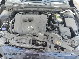 2015 Mazda 3 i Touring with VIN 3MZBM1V77FM128103, listed as a Copart auction lot 56156555 with 107,460 mi miles and Salvage Title. Bid and sale history available at DreamBid. Image 11.