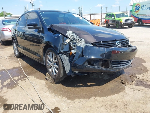 2013 Volkswagen Jetta SE z VIN 3VWDP7AJ3DM438668, wystawiony jako IAAI lot #42235014 z przebiegiem 128 406 mil mil oraz . Historia ofert i sprzedaży dostępna na DreamBid. Obrazek 1.