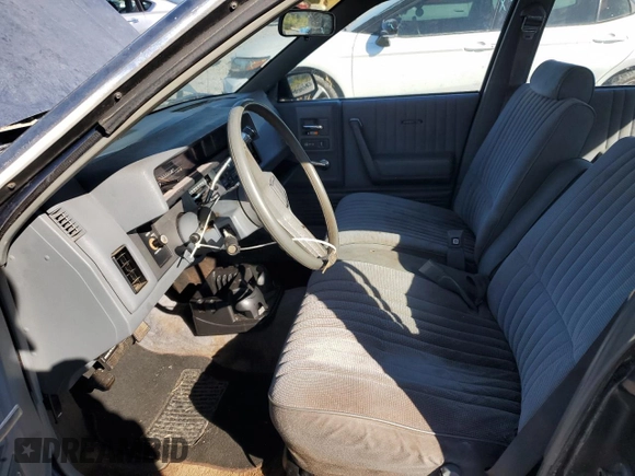 1989 Chevrolet Celebrity z VIN 1G1AW51W8K6185894, wystawiony jako Copart lot #75610854 z przebiegiem 111 268 mil mil oraz Czysty tytuł • Clean title. Historia ofert i sprzedaży dostępna na DreamBid. Obrazek 7.