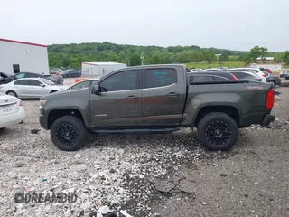 2018 Chevrolet Colorado 4WD LT z VIN 1GCGTCEN2J1235085, wystawiony jako IAAI lot #42192629 z przebiegiem 83 914 mil mil oraz . Historia ofert i sprzedaży dostępna na DreamBid. Obrazek 14.