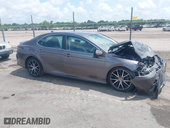 2022 Toyota Camry SE z VIN 4T1G11AK0NU057778, wystawiony jako IAAI lot #42094950 z przebiegiem 115 649 mil mil oraz . Historia ofert i sprzedaży dostępna na DreamBid. Obrazek 13.