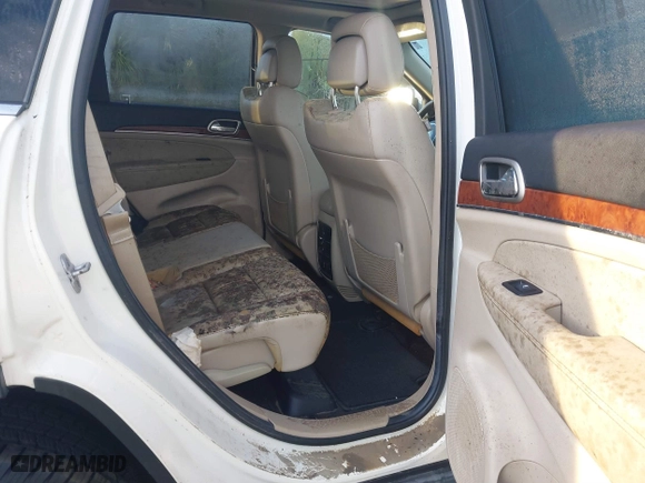 2011 Jeep Grand Cherokee Limited with VIN 1J4RR5GG0BC668910, listed as a IAAI auction lot 41353138 with 74,388 mi miles. Bid and sale history available at carsss.com. Image 8.