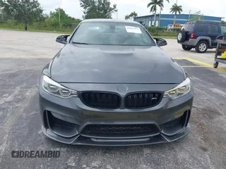 2016 BMW M4 with VIN WBS3U9C51GP968602, listed as a IAAI auction lot 42442452 with 3 mi miles and . Bid and sale history available at DreamBid. Image 6.