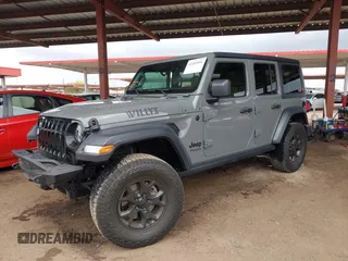 2020 Jeep Wrangler Unlimited Black and Tan с VIN 1C4HJXDG3LW266615, выставлен на аукционе IAAI как лот 42207899 с пробегом 55 291 миль миль и . История ставок и продаж доступна на DreamBid. Изображение 17.