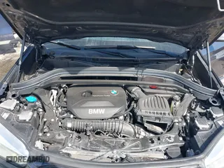 2017 BMW X1 xDrive28i with VIN WBXHT3Z33H4A65198, listed as a IAAI auction lot 41798503 with 88,951 mi miles. Bid and sale history available at carsss.com. Image 10.