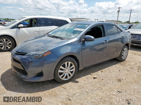 2019 Toyota Corolla L with VIN 2T1BURHEXKC242935, listed as a Copart auction lot 60103185 with 74,090 mi miles and Salvage title. Bid and sale history available at DreamBid. Image 1.