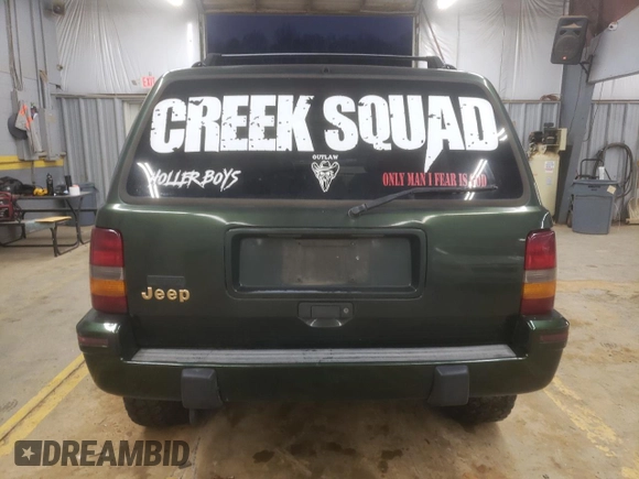 1995 Jeep Grand Cherokee Limited z VIN 1J4GZ78S7SC766726, wystawiony jako Copart lot #84909134 z przebiegiem 174 256 mil mil oraz Szkoda całkowita • Salvage title. Historia ofert i sprzedaży dostępna na DreamBid. Obrazek 6.