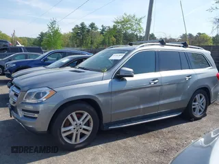 2014 Mercedes-Benz GL 450 with VIN 4JGDF7CE0EA290673, listed as a IAAI auction lot 42207889 with 132,251 mi miles and . Bid and sale history available at DreamBid. Image 14.